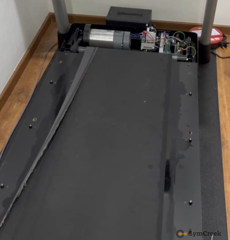 treadmill belt folded over with hood side panels removed