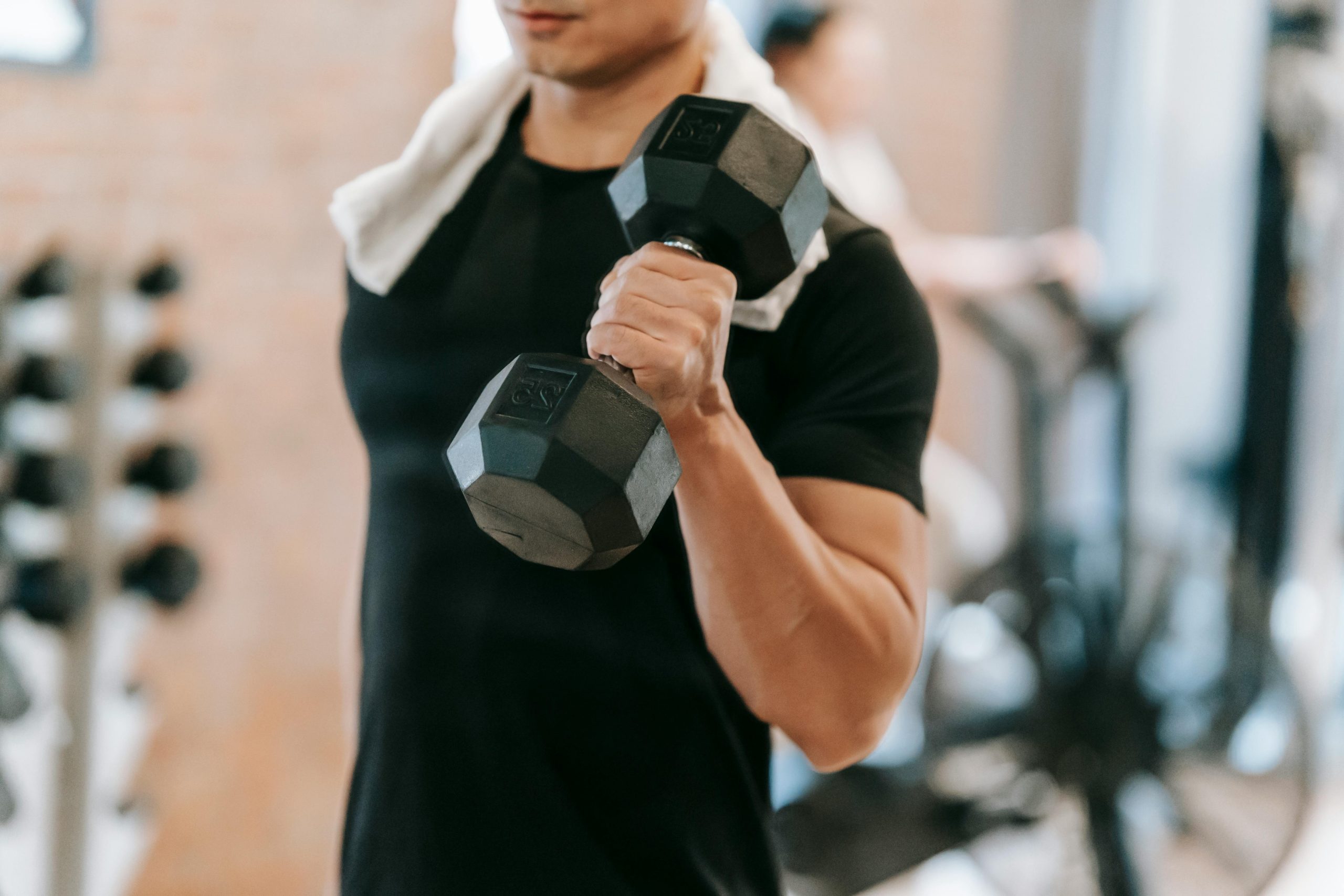 person lifting heavy dumbbells person lifting heavy dumbbells