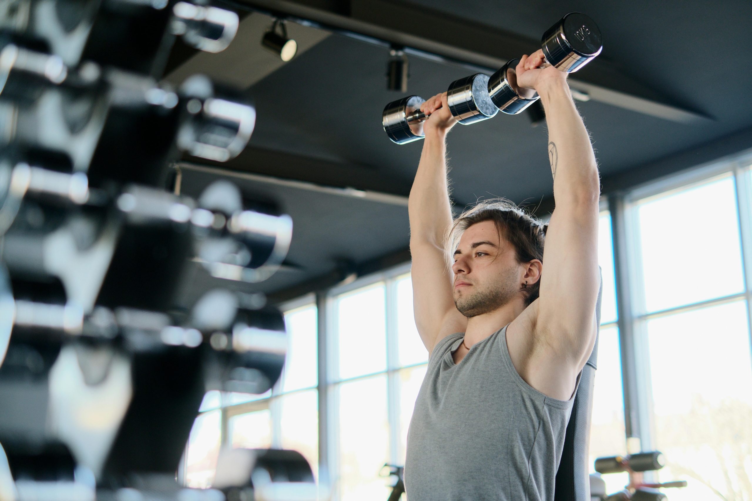 person lifting weights person lifting weights