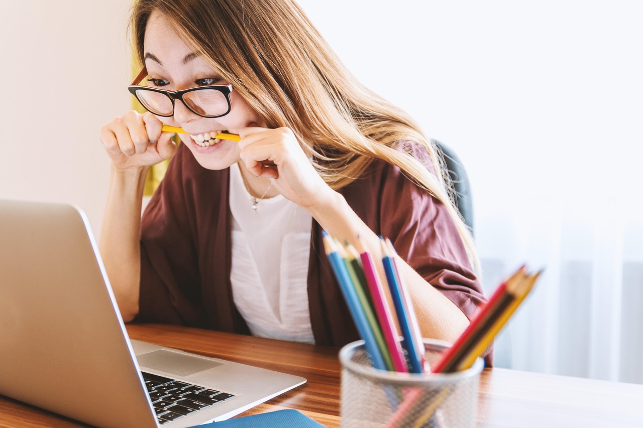 person sitting at desk person sitting at desk