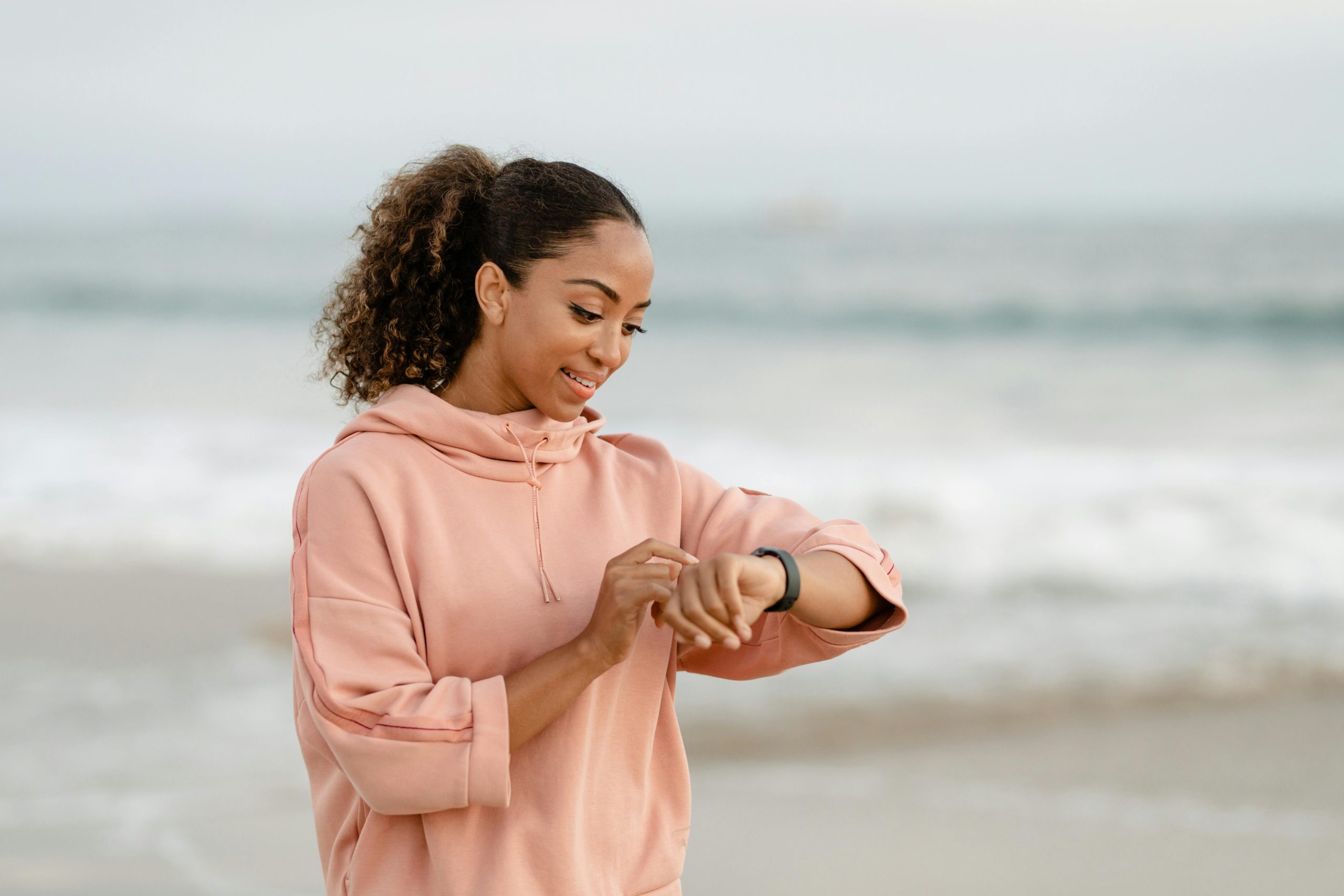 person wearing smartwatch person wearing smartwatch