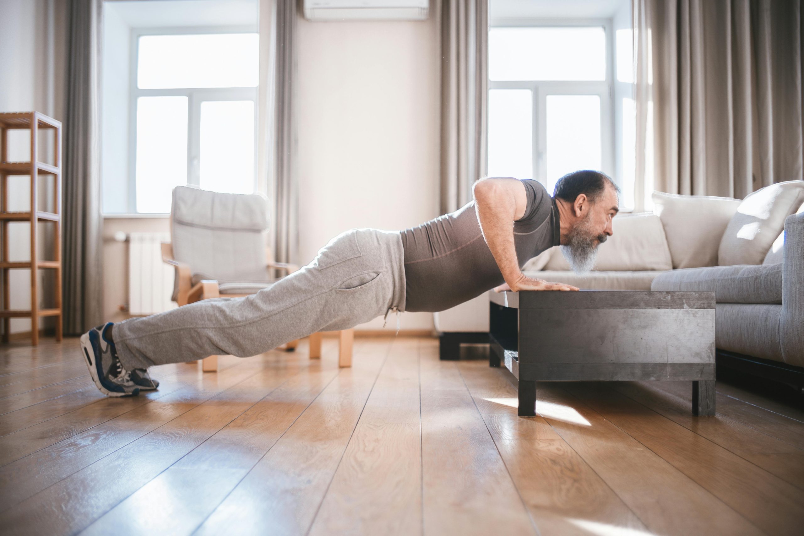 senior person exercising senior person exercising