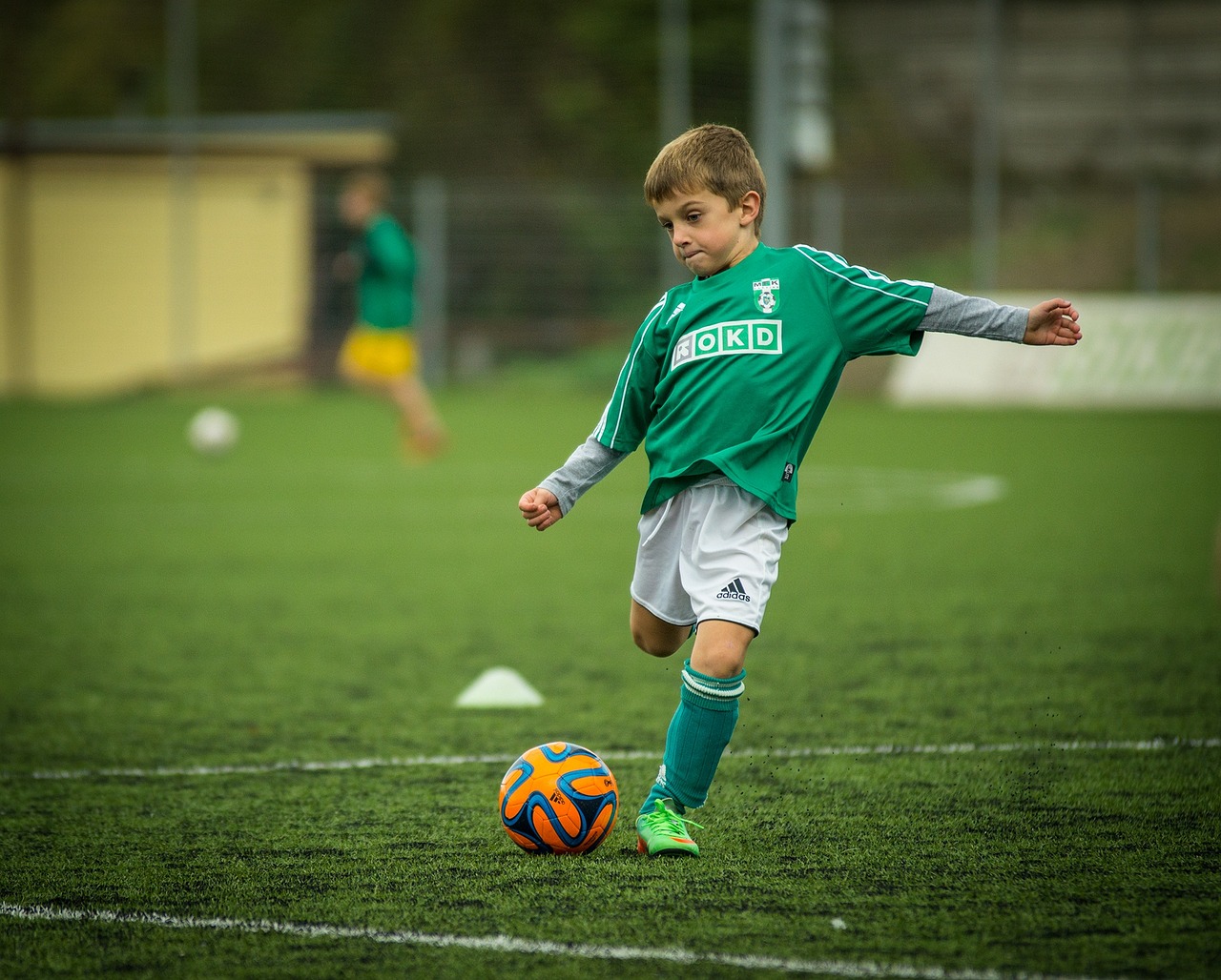 teenager playing soccer teenager playing soccer
