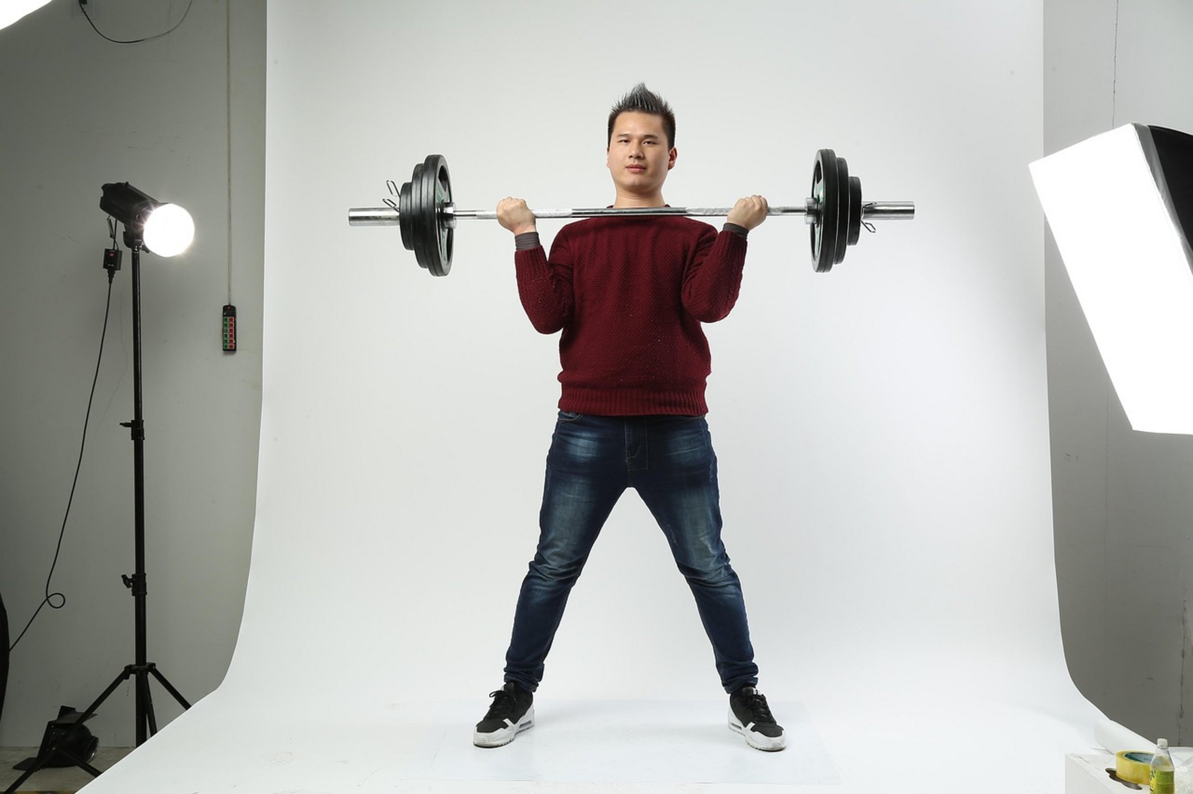 hands holding dumbbells hands holding dumbbells