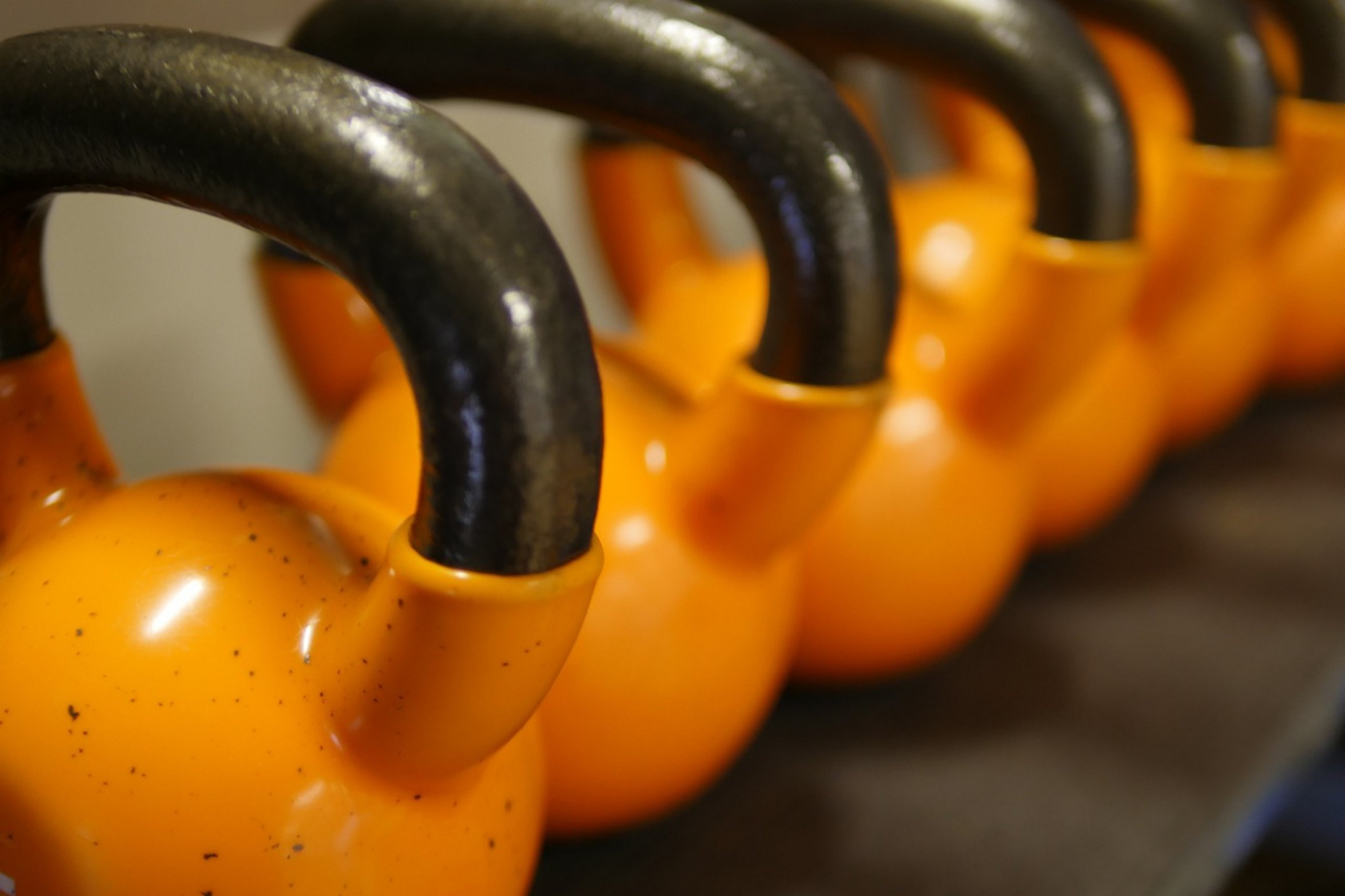 person lifting kettlebell person lifting kettlebell