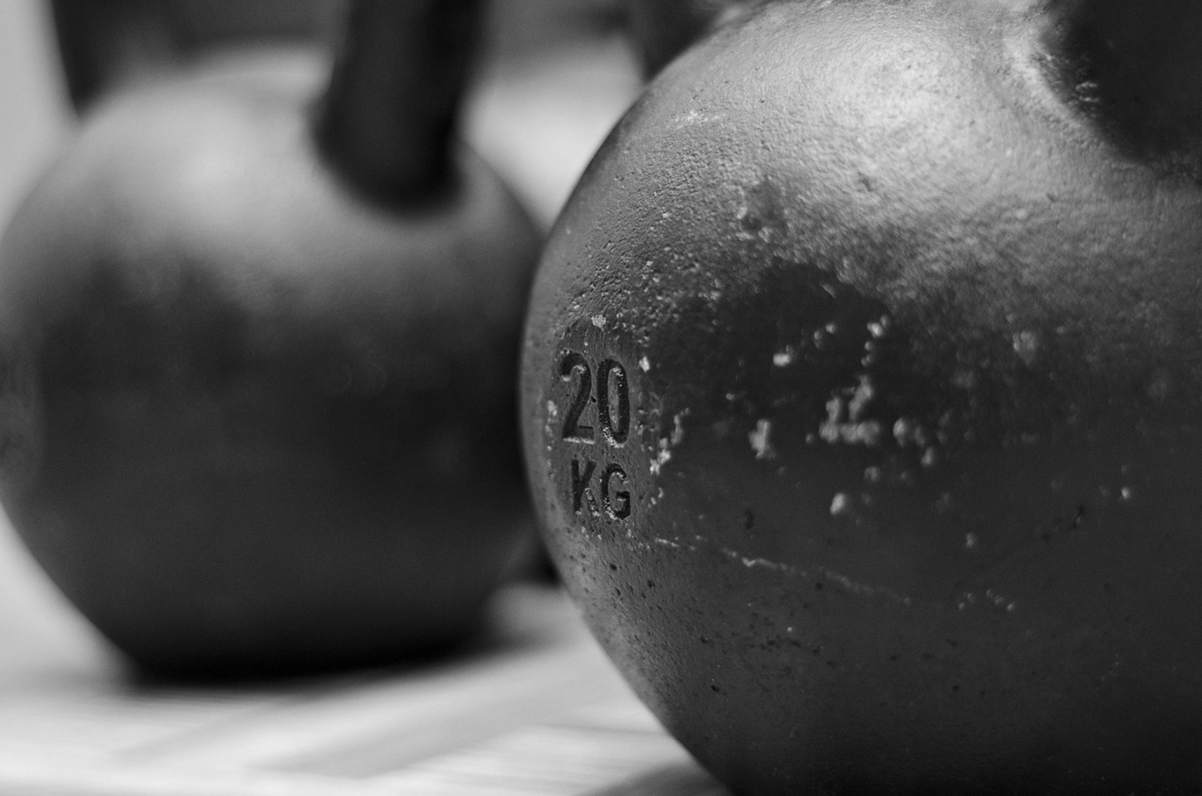 woman lifting kettlebell woman lifting kettlebell